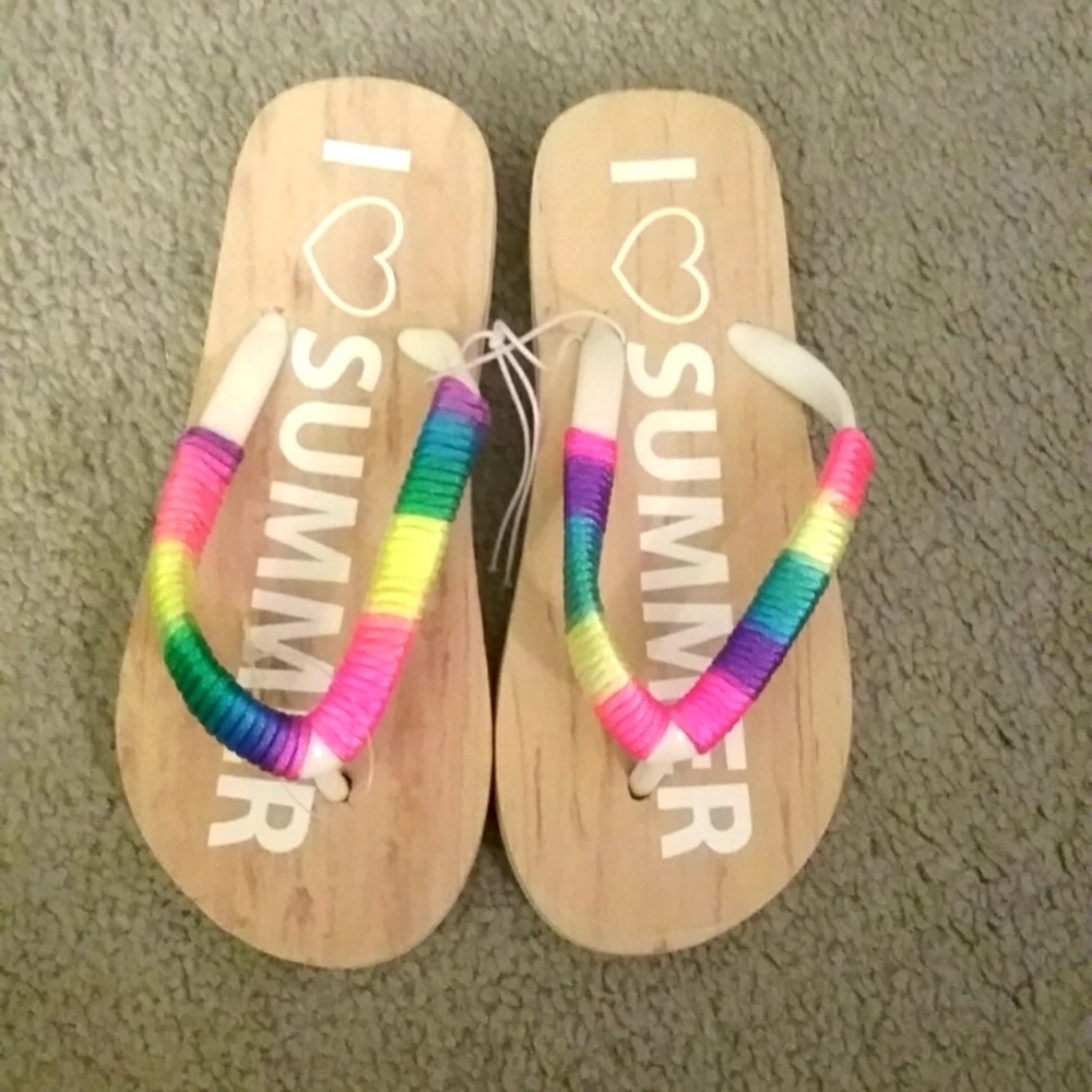 Brand new youth girl size 7.5 rainbow flip-flops